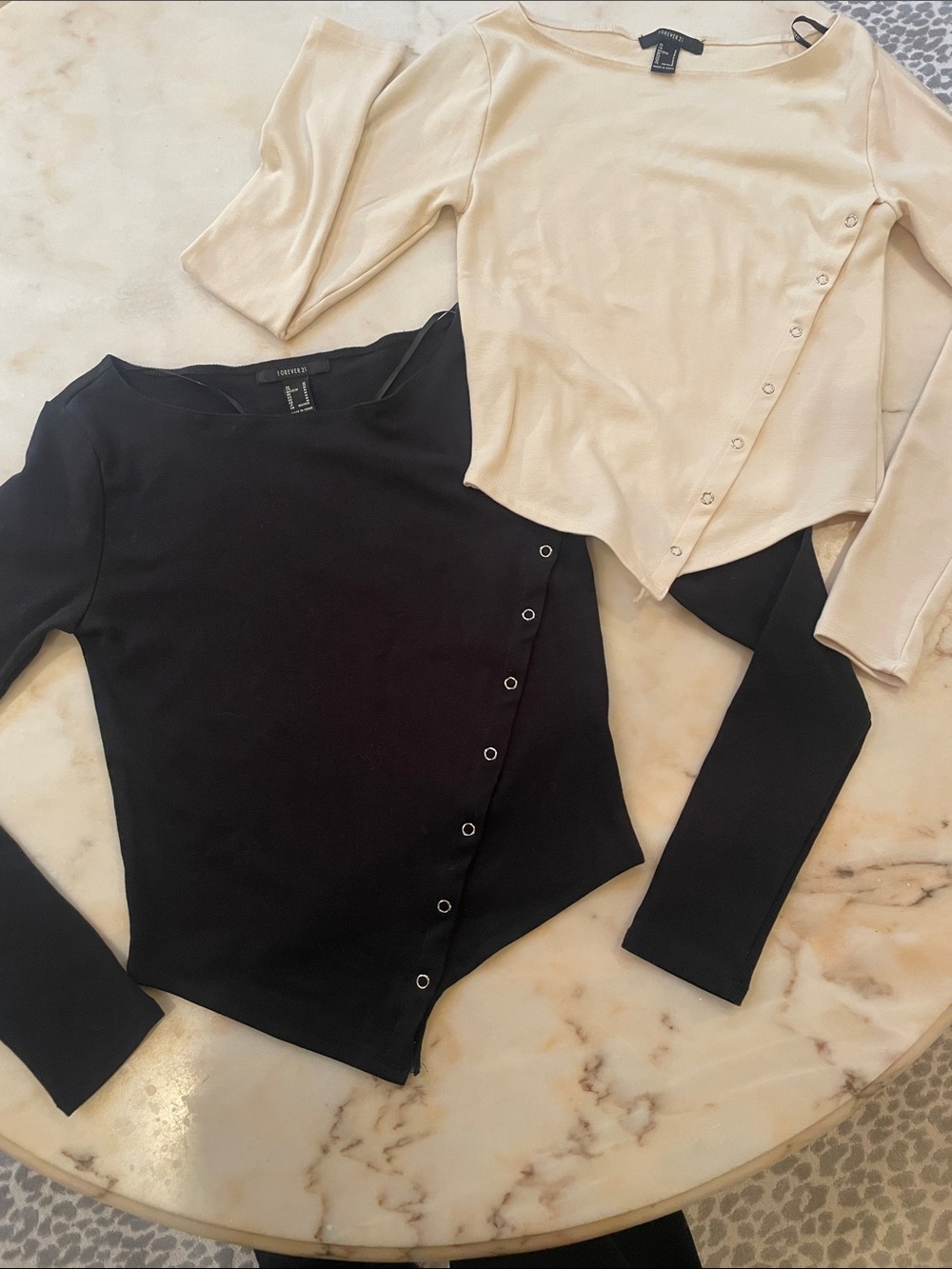 2 long sleeve Asymmetrical Snap-Front top , 1 black - 1 off white